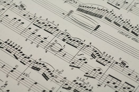 close-up of an old music sheet, very shallow DOF!