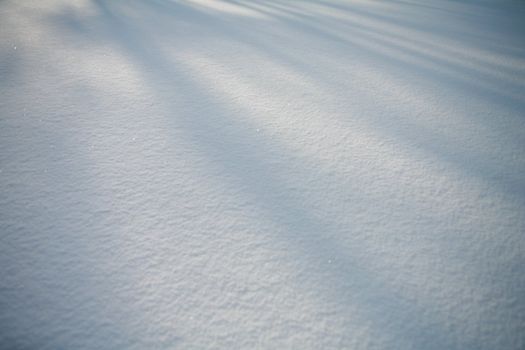 Details of a beautiful snow surface perfect for backgrounds on greeting cards etc.