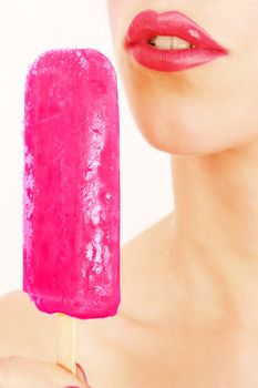 woman licking popsicle