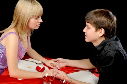 Romantic supper. Young the man proposal the offer to the girl