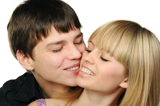 Young enamoured pair. It is isolated on a white background