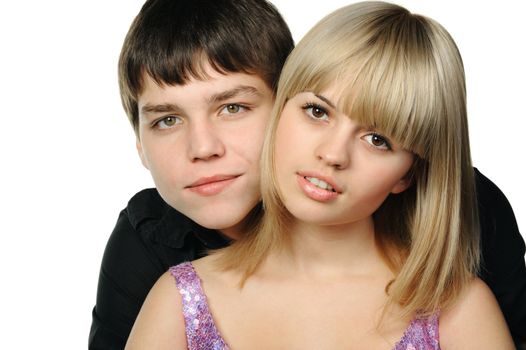 Young enamoured pair. It is isolated on a white background