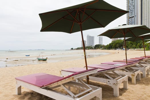 Chairs on the beach near the sea views.