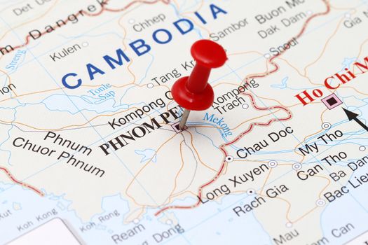 Pin pointing Phnompen capital of cambodia.