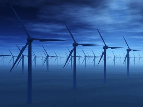 Wind power stations. Early morning, a fog. A dark blue tonality