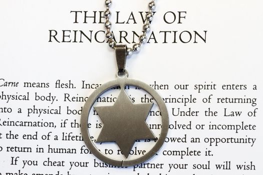 Hexagram on the law of reincarnation chapter of book in quantum physics.