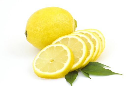 whole lemon and slices on white background 