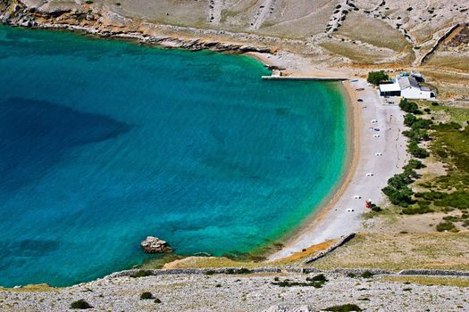 Hidden pebbles and sand beach in Vela Luka, Island pf Krk, Croatia