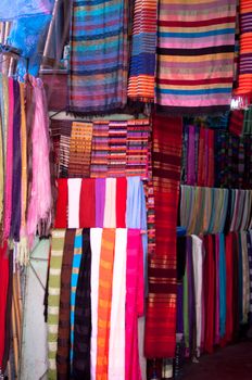 Variety of colorful scarves soled in Medina in Marrakech, Morocco