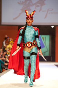 CANARY ISLANDS - 29 OCTOBER: Model on the catwalk wearing carnival costume from designer Mari Patron Dominguez during Carnival Fashion Week October 29, 2011 in Canary Islands, Spain