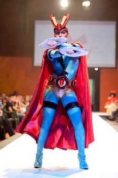 CANARY ISLANDS - 29 OCTOBER: Model on the catwalk wearing carnival costume from designer Mari Patron Dominguez during Carnival Fashion Week October 29, 2011 in Canary Islands, Spain