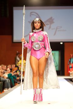 CANARY ISLANDS - 29 OCTOBER: Model on the catwalk wearing carnival costume from designer Mari Patron Dominguez during Carnival Fashion Week October 29, 2011 in Canary Islands, Spain