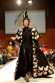 CANARY ISLANDS - 29 OCTOBER: Model on the catwalk wearing carnival costume from designer Mari Patron Dominguez during Carnival Fashion Week October 29, 2011 in Canary Islands, Spain