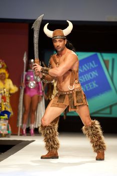 CANARY ISLANDS - 29 OCTOBER: Model on the catwalk wearing carnival costume from designer Mari Patron Dominguez during Carnival Fashion Week October 29, 2011 in Canary Islands, Spain