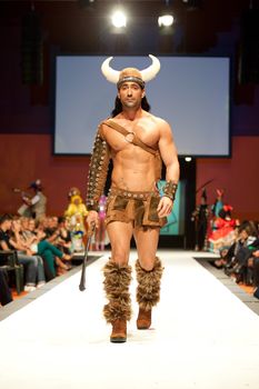 CANARY ISLANDS - 29 OCTOBER: Model on the catwalk wearing carnival costume from designer Mari Patron Dominguez during Carnival Fashion Week October 29, 2011 in Canary Islands, Spain