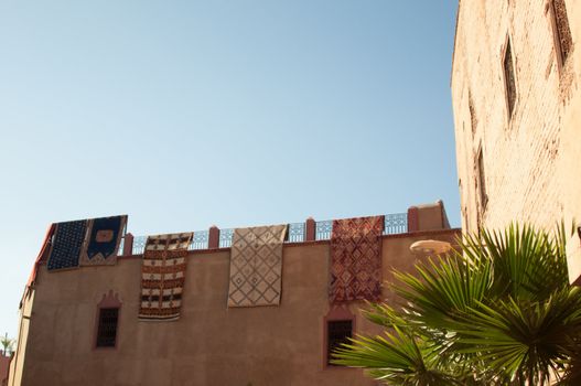 Moroccan building with newly produced Berber carpets in the Medina of Marrakech