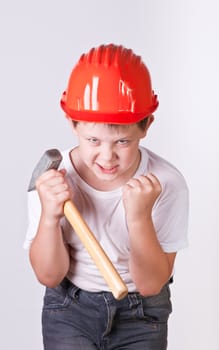 Portrait of a boy in a red protective helmet