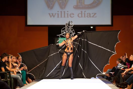 CANARY ISLANDS - 29 OCTOBER: Model on the catwalk wearing carnival costume from designer Willie Diaz during Carnival Fashion Week October 29, 2011 in Canary Islands, Spain