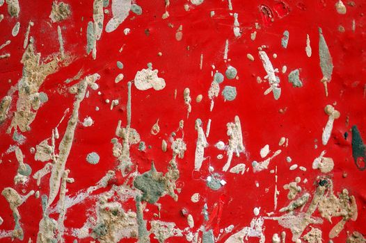 Metal sheeting texture detail with paint and cement stains.