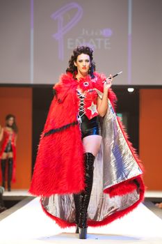 CANARY ISLANDS - 29 OCTOBER: Model on the catwalk wearing carnival costume from designer Juan Penate during Carnival Fashion Week October 29, 2011 in Canary Islands, Spain