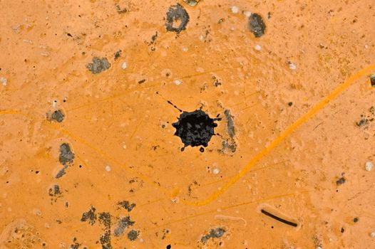 Industrial metal texture detail with paint and cement stains.