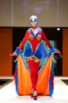 CANARY ISLANDS - 29 OCTOBER: Model on the catwalk wearing carnival costume from designer Juan Penate during Carnival Fashion Week October 29, 2011 in Canary Islands, Spain