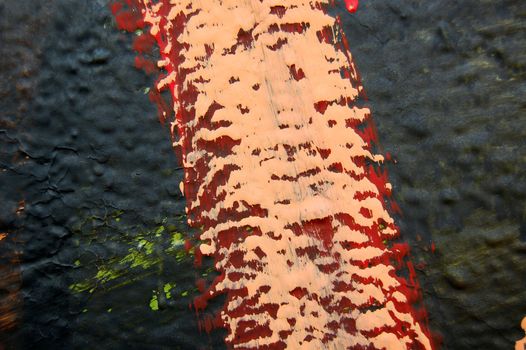 Single paint stroke on a black background. Abstract background texture.