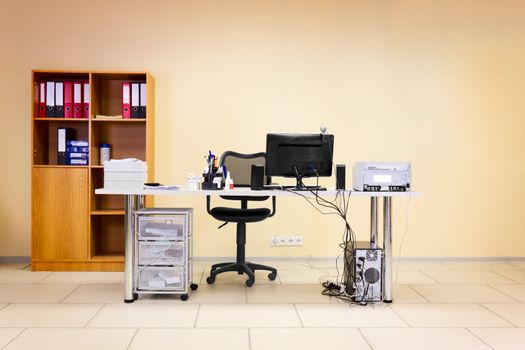 Empty office working place with computer, web camera and space for your text