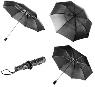 Opened and closed black umbrella isolated over white background