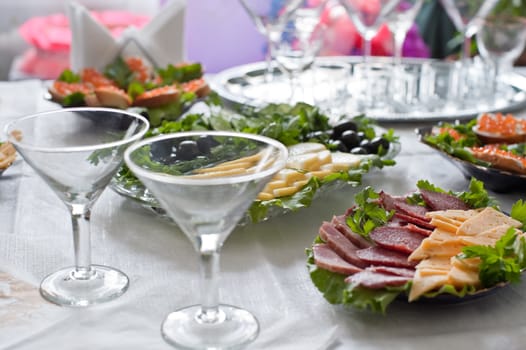 Buffet table. A table with glasses and easy snack