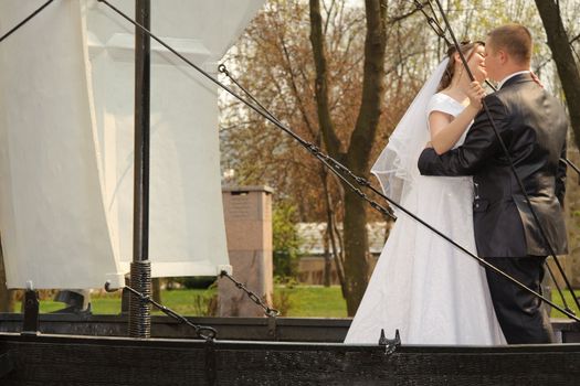 Newly-married couple. Pair young men in wedding day