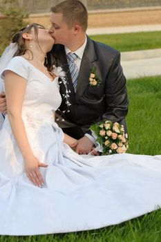 Newly-married couple. Pair young men in wedding day