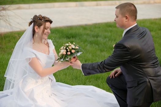 Newly-married couple. Pair young men in wedding day