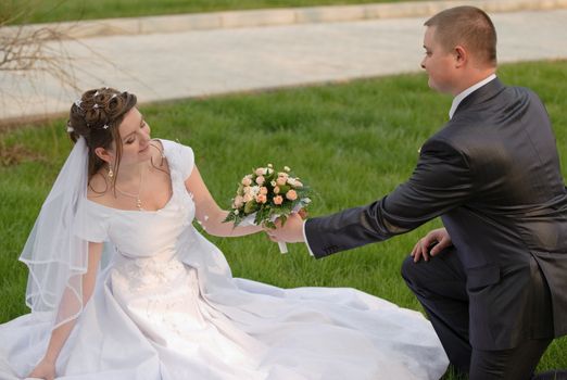 Newly-married couple. Pair young men in wedding day