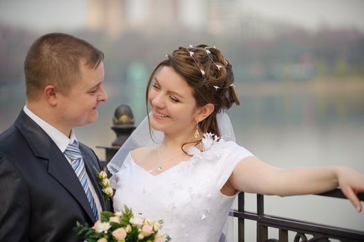 Newly-married couple. Pair young men in wedding day