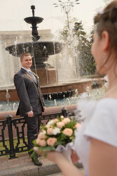 Newly-married couple. Pair young men in wedding day