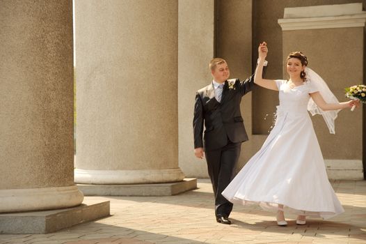 Newly-married couple. Pair young men in wedding day