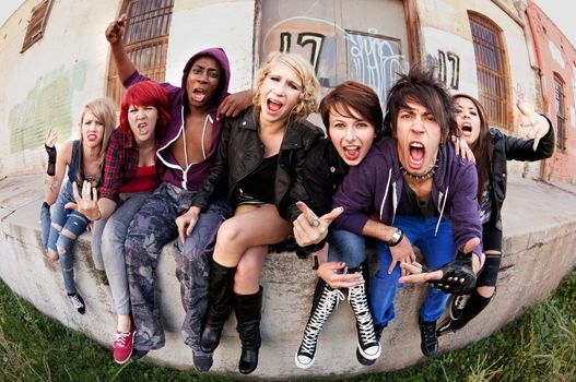 A group of angry young teens express themselves to the camera.