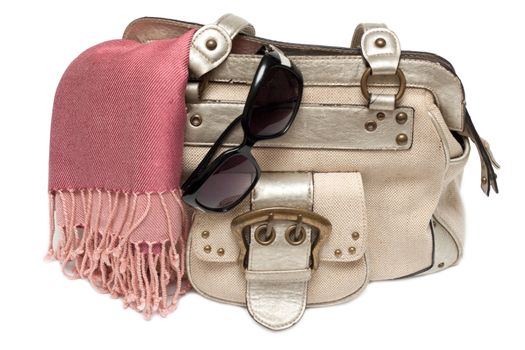 Lady hand-bag in rose charge and sun-protective spectacles