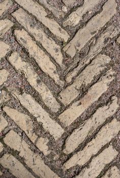 Stone pattern on land roadway in the manner of background