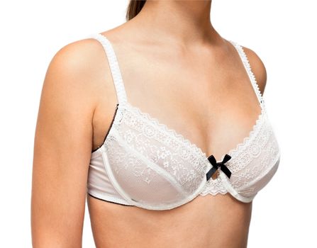 Young girl in white bra with black bow