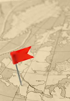 Flag a pin. A label on a planimetric map