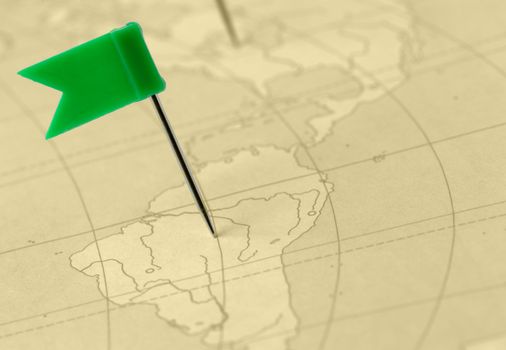 Flag a pin. A label on a planimetric map
