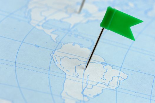 Flag a pin. A label on a planimetric map