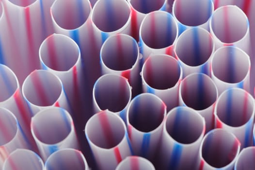 Tubules for a cocktail. An abstract background from plastic tubules
