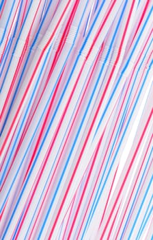 Tubules for a cocktail. An abstract background from plastic tubules