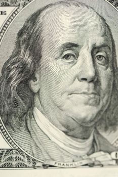 Franklin closeup portrait. A fragment of a photo hundred dollar denominations