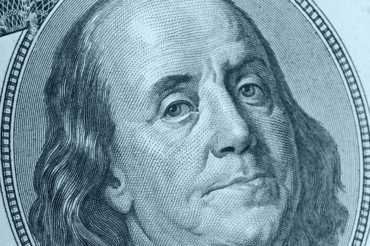Benjamin Franklin close up. A fragment of a photo hundred dollar denominations