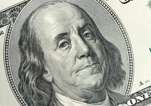 Dollar - close up. A fragment of a photo hundred dollar denominations