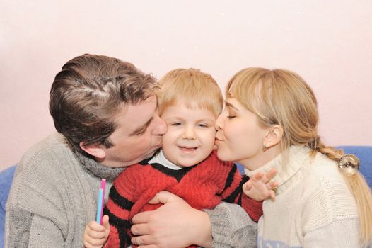 Happy family. Family from three person in house conditions